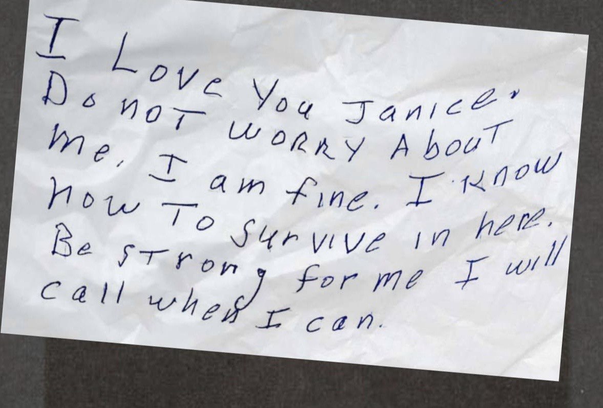 A handwritten note from John McAfee to Janice